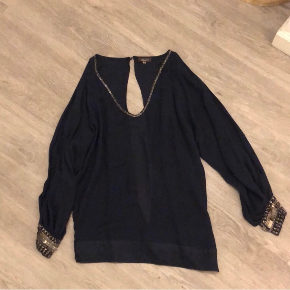 Deep blue embellished tunic.